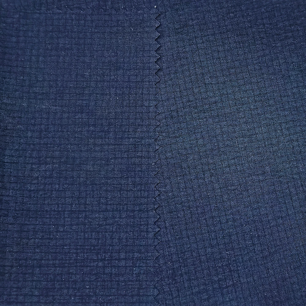 Side-by-side view of face grid fabric and micro-textured backing of 40D nylon stretch material