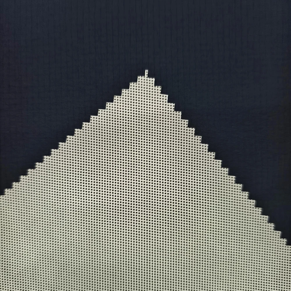 Macro surface texture of dark 40D nylon ripstop woven fabric with reinforced grid lines