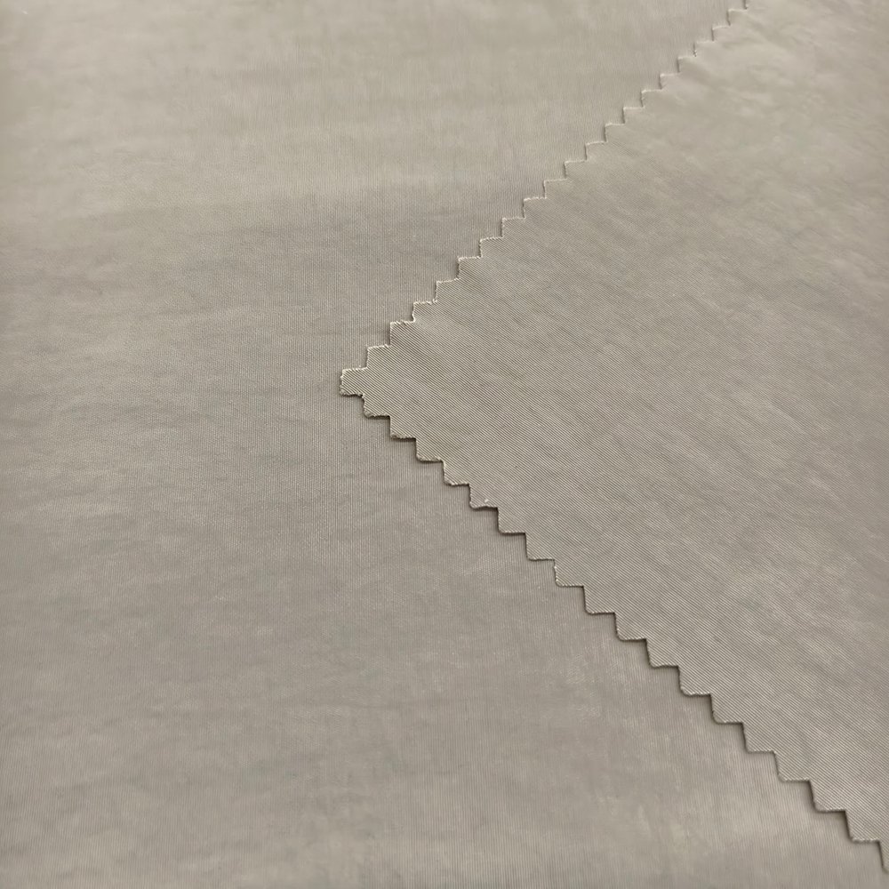 Shaoxing Yuyuan 100% Nylon 109GSM Water Resistant Stretch Fabric Anti-Pill Quick-Dry Breathable Anti-Pull for Garment Sportswear - Image 5