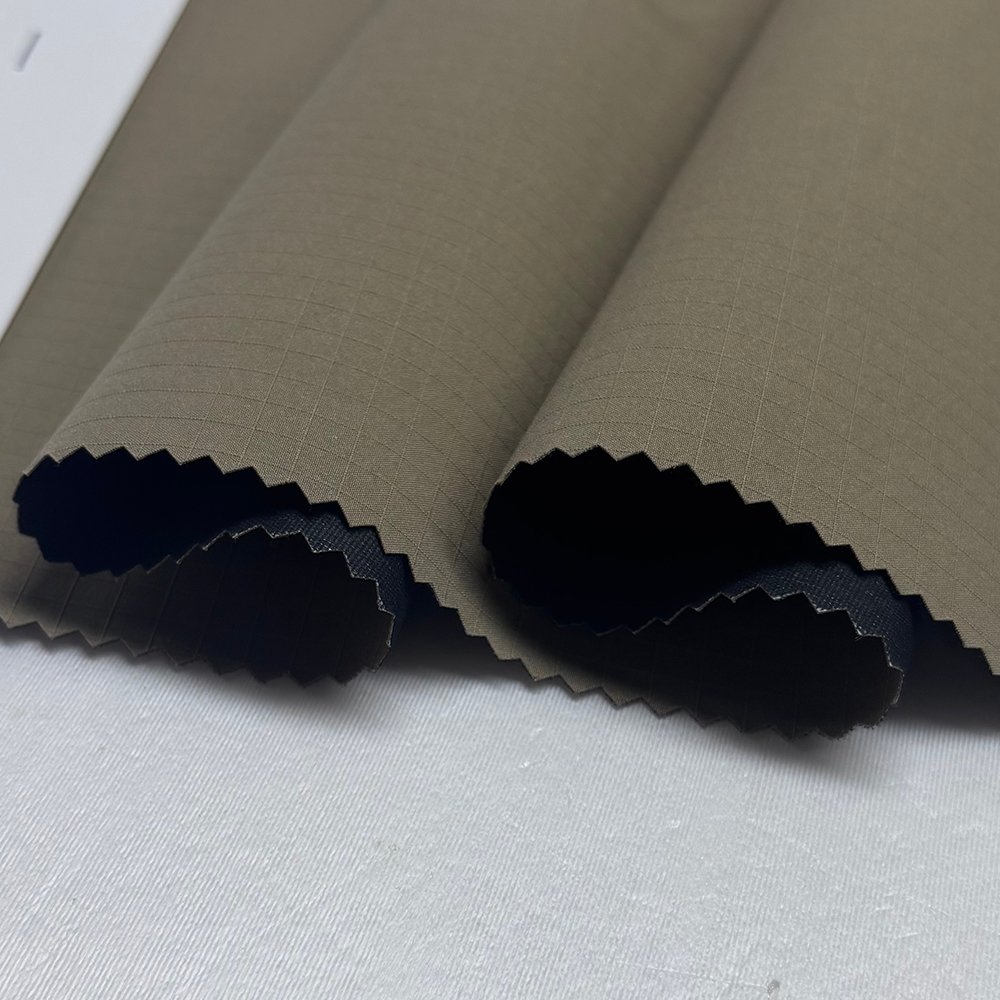 Shaoxing Yuyuan Polyester Ripstop Fabric Down Proof Lightweight for Down Jacket Cotton Jacket Winter Outdoor